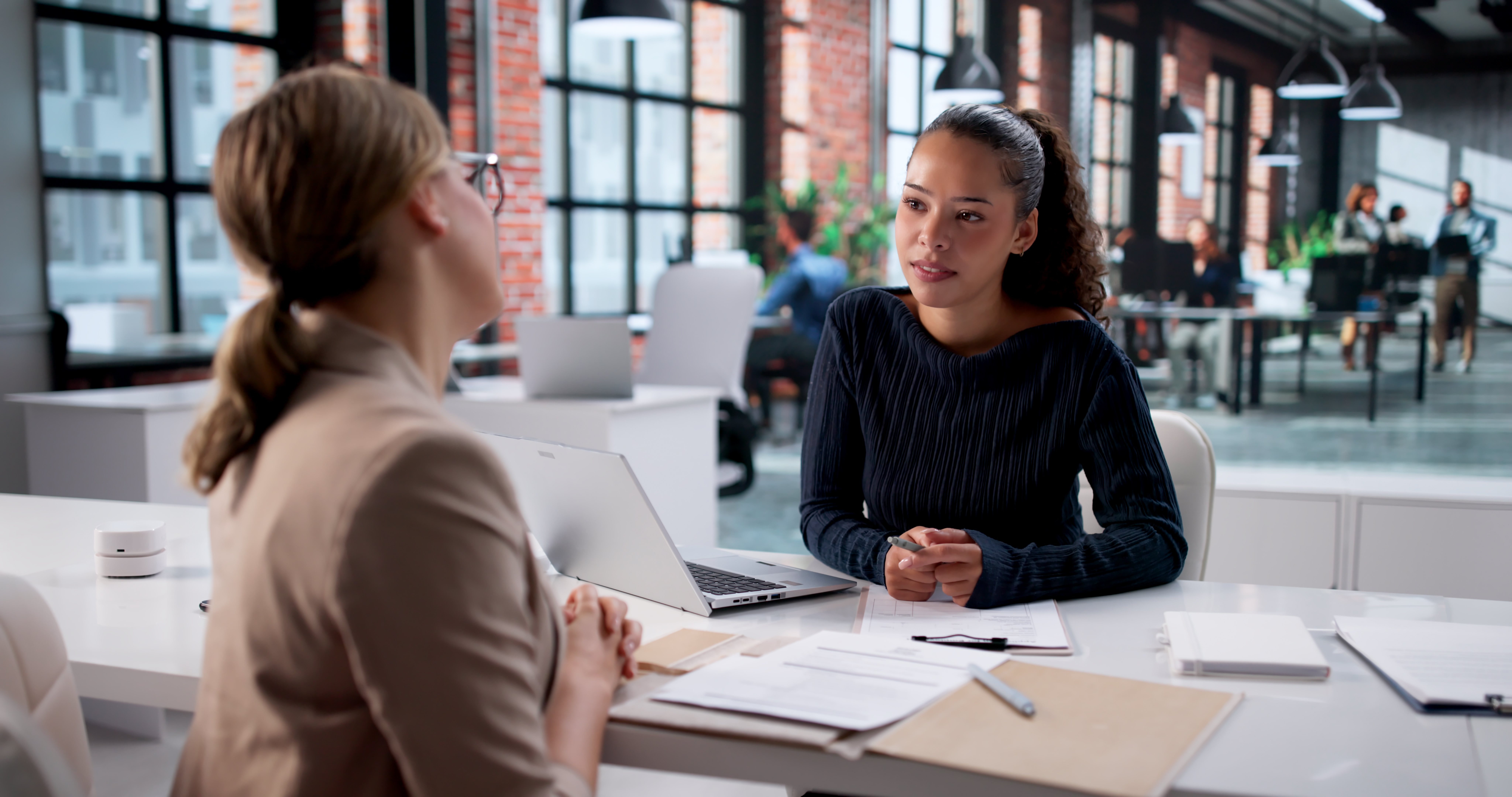 Diverse Businesswoman Conducts Interview For Executive Position At Corporate Office.